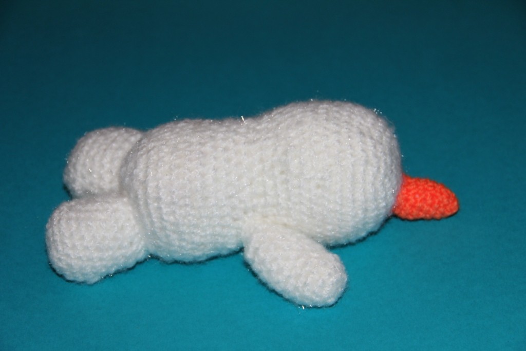 Blog-Inhaltsbild für 'Kostenlose Häkelanleitung - Kleiner Schneemann mit seinem Kuschelstern'