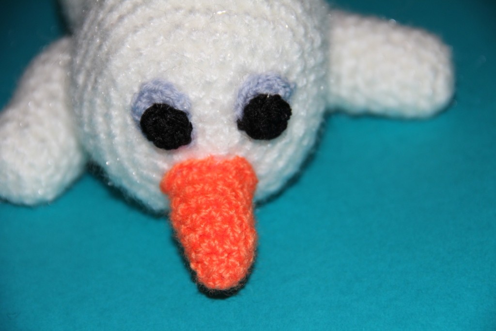 Blog-Inhaltsbild für 'Kostenlose Häkelanleitung - Kleiner Schneemann mit seinem Kuschelstern'