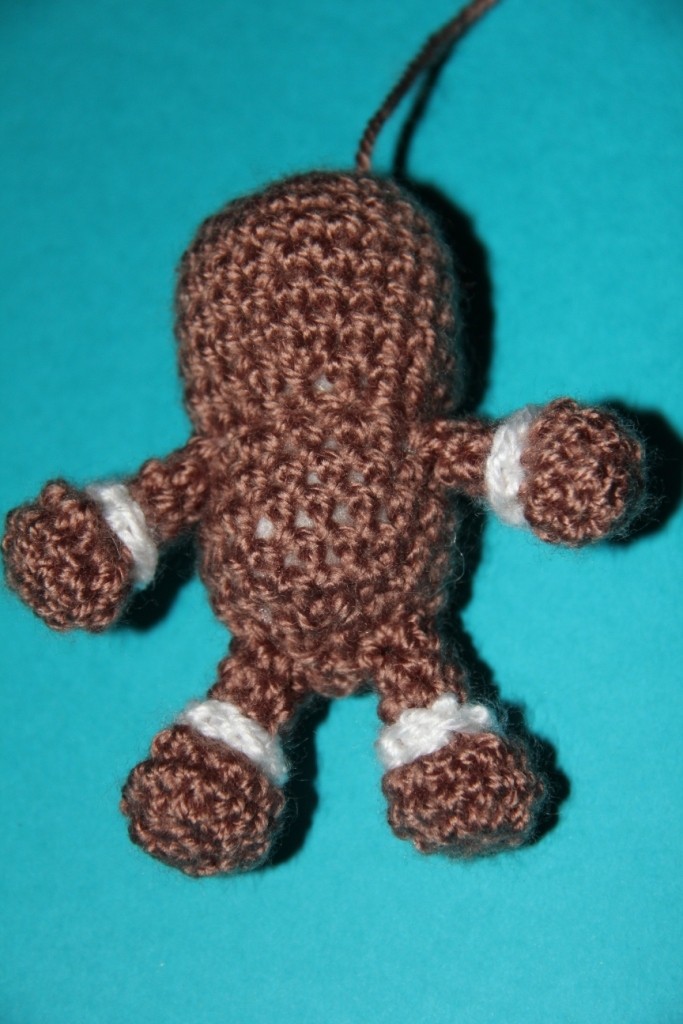 Blog-Inhaltsbild für 'Kostenlose Häkelanleitung - Kleines Lebkuchenmännchen als Schlüsselanhänger oder Taschenbaumler'