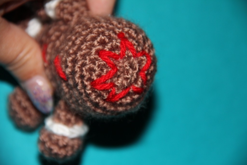 Blog-Inhaltsbild für 'Kostenlose Häkelanleitung - Kleines Lebkuchenmännchen als Schlüsselanhänger oder Taschenbaumler'