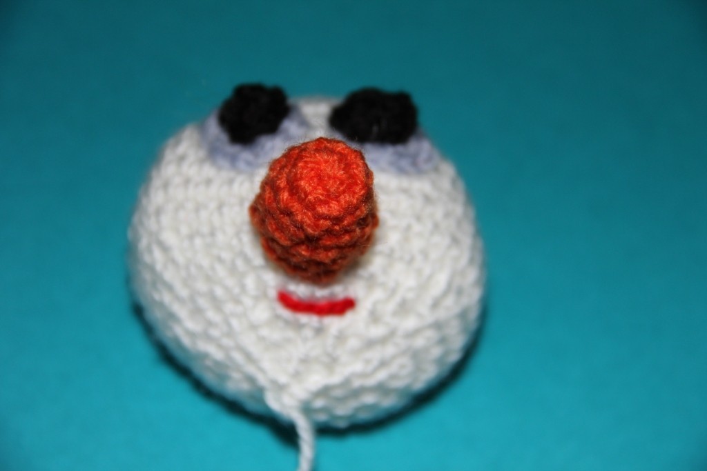 Blog-Inhaltsbild für 'Kostenlose Häkelanleitung - Geschenkidee - Kleiner Schneemann als Untersetzer'