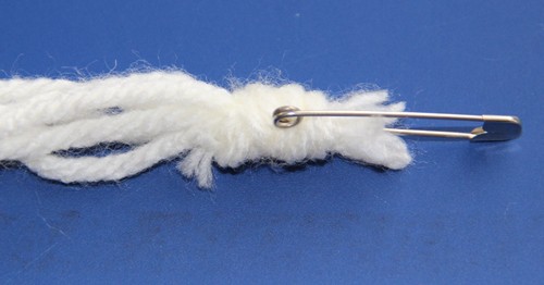 Blog-Inhaltsbild für 'Kostenlose Häkelanleitung: Kissen mit Fransen aus Wollresten - für Häkelanfänger geeignet'