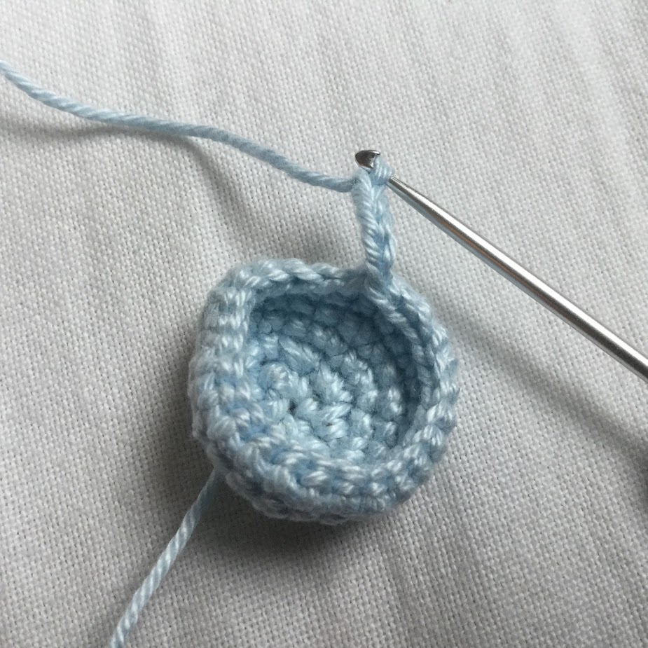 Blog-Inhaltsbild für 'Kostenlose Häkelanleitung Taschenbaumler Schnecke'