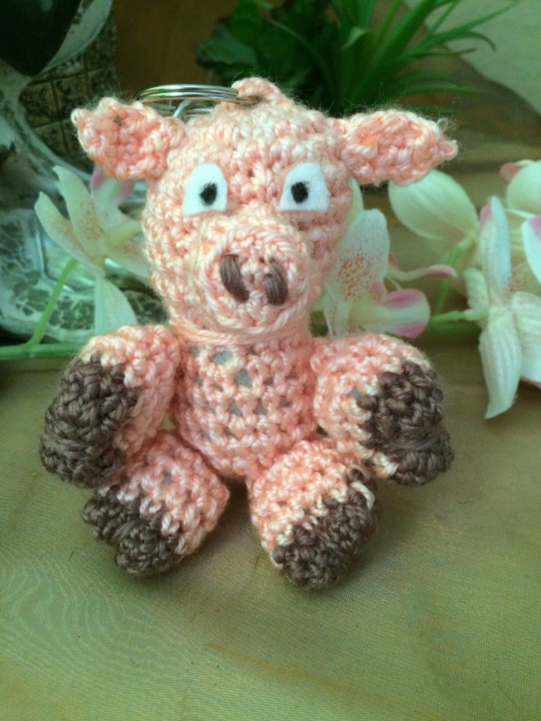 Blog-Inhaltsbild für 'Kostenlose Häkelanleitung - Kleines Schweinchen - Schlüsselanhänger/Taschenbaumler'
