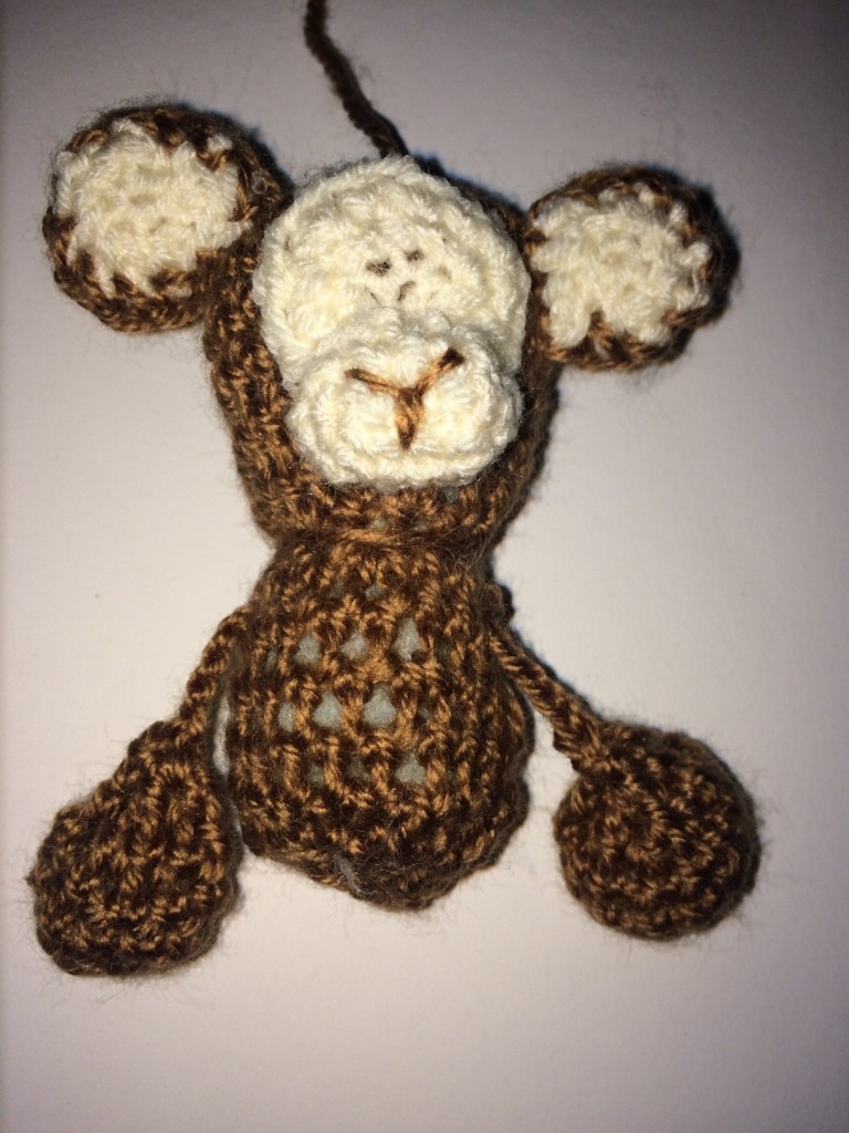 Blog-Inhaltsbild für 'Kostenlose Häkelanleitung - Kleiner Affe - Schlüsselanhänger -Taschenbaumler'