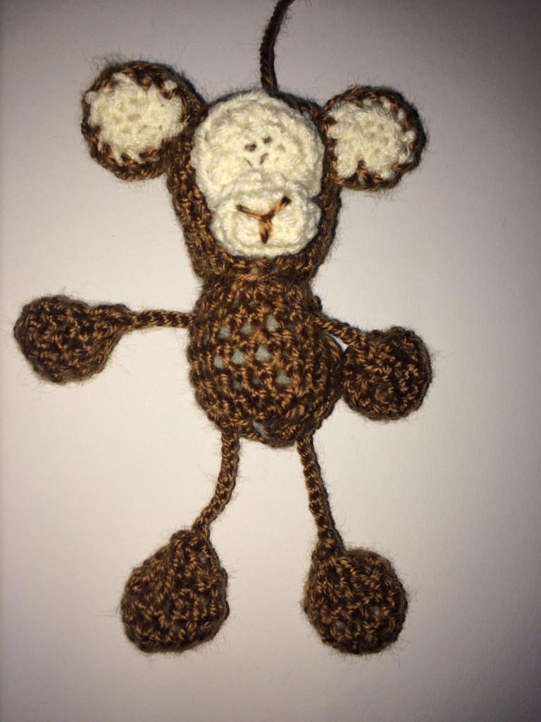 Blog-Inhaltsbild für 'Kostenlose Häkelanleitung - Kleiner Affe - Schlüsselanhänger -Taschenbaumler'