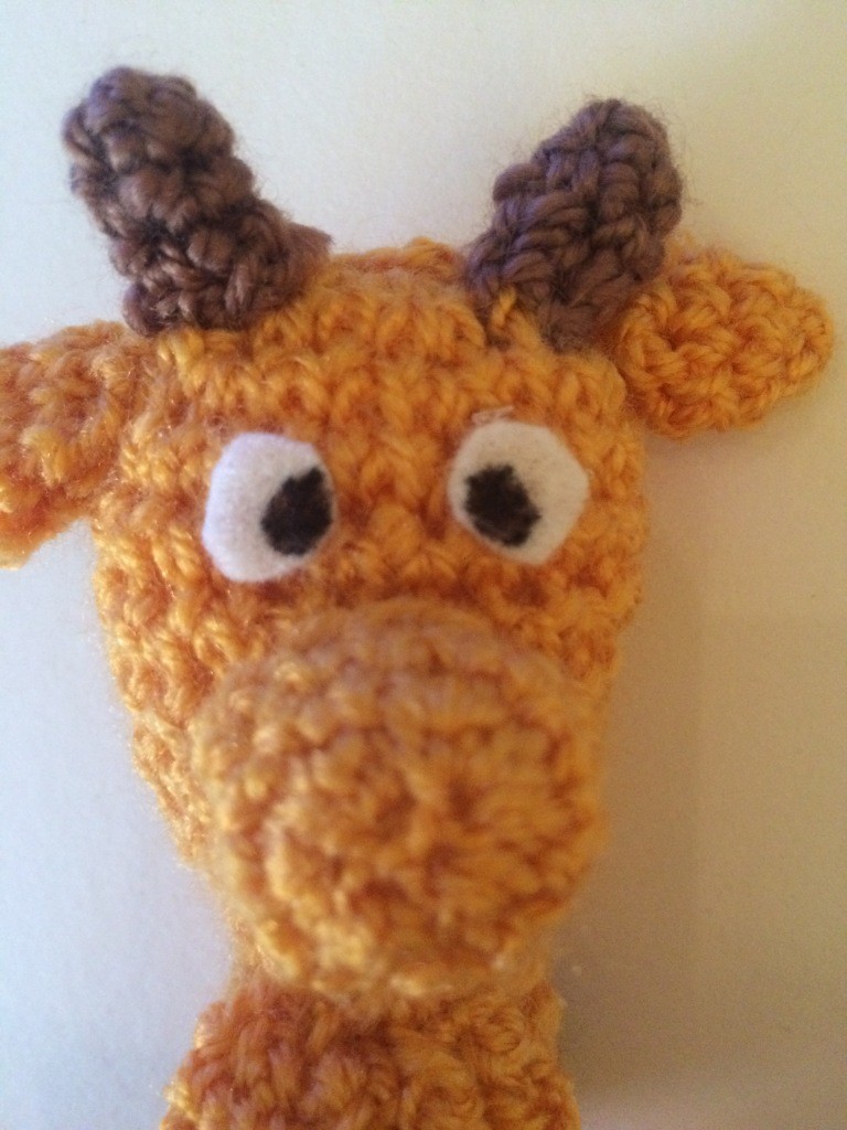 Blog-Inhaltsbild für 'Kostenlose Häkelanleitung - Kleine Giraffe - Schlüsselanhänger Taschenbaumler'