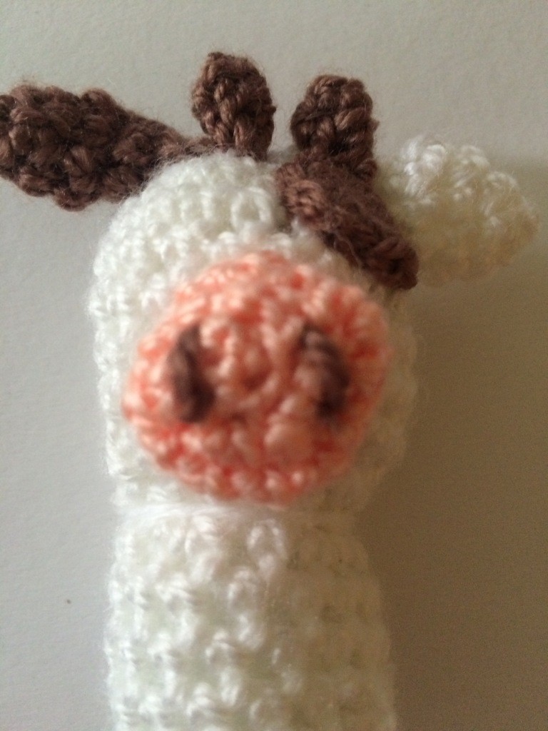 Blog-Inhaltsbild für 'Kostenlose Häkelanleitung - Kleine Kuh -Schlüsselanhänger Taschenbaumler'