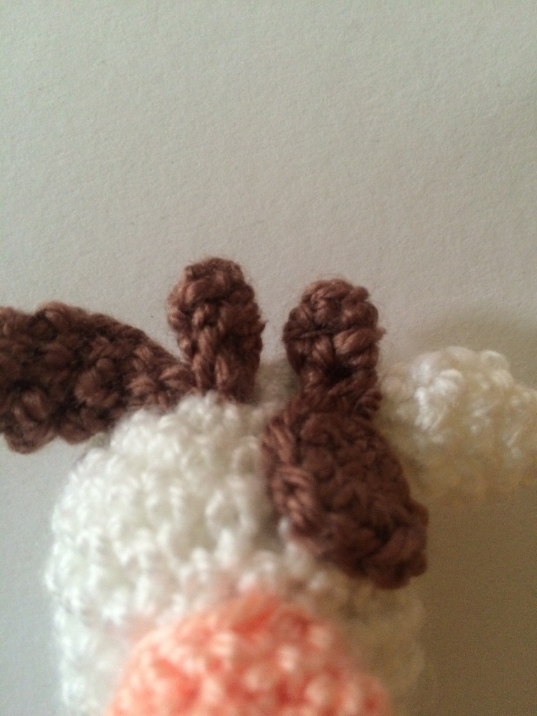 Blog-Inhaltsbild für 'Kostenlose Häkelanleitung - Kleine Kuh -Schlüsselanhänger Taschenbaumler'