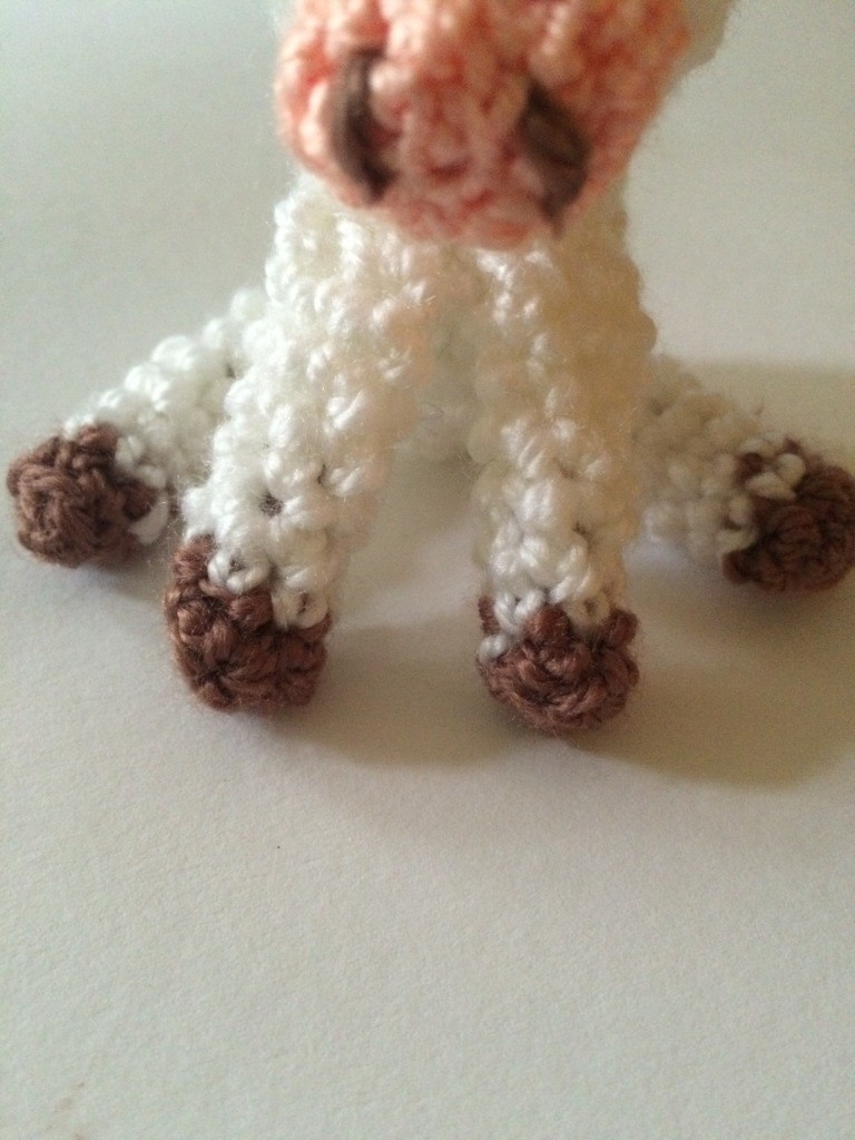 Blog-Inhaltsbild für 'Kostenlose Häkelanleitung - Kleine Kuh -Schlüsselanhänger Taschenbaumler'