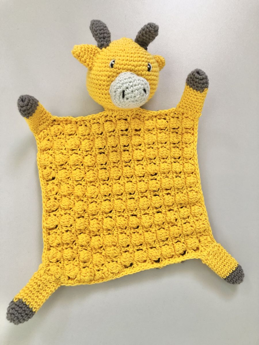 Blog-Inhaltsbild für 'Kostenlose Häkelanleitung Giraffentuch'