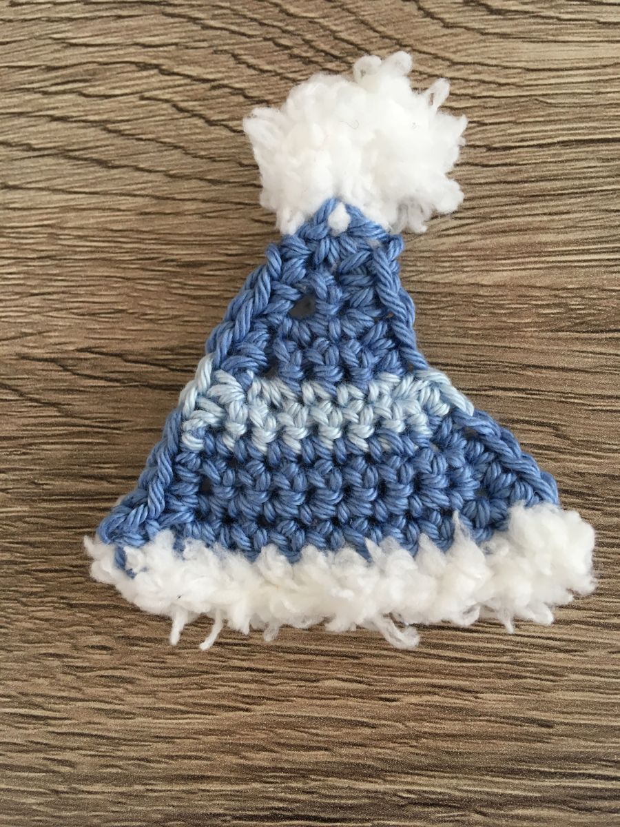 Blog-Inhaltsbild für 'Weihnachtsmütze, kostenlose Häkelanleitung'