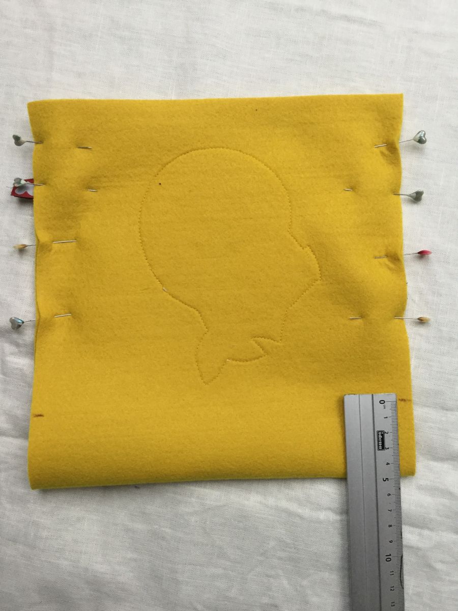 Blog-Inhaltsbild für 'Kostenlose Nähanleitung: Schnelles Utensilo aus Filz mit Origamiecken'