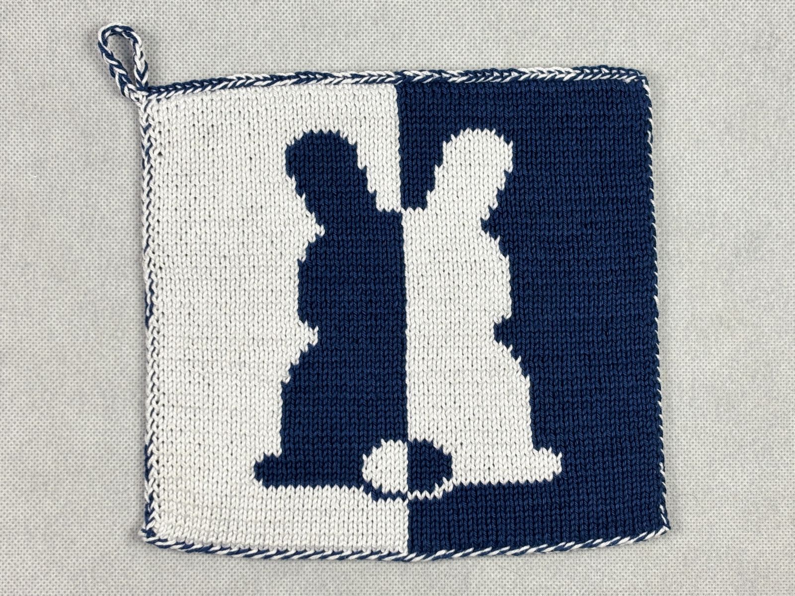 Blog-Inhaltsbild für 'Topflappen stricken im Doubleface Muster – Gratis Anleitung mit Hasenmotiv (auch als Waschlappen oder Schmusetuch geeignet)'