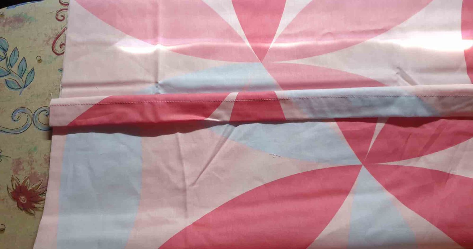 Die beiden Verschlusskanten sind übereinandergeklappt.