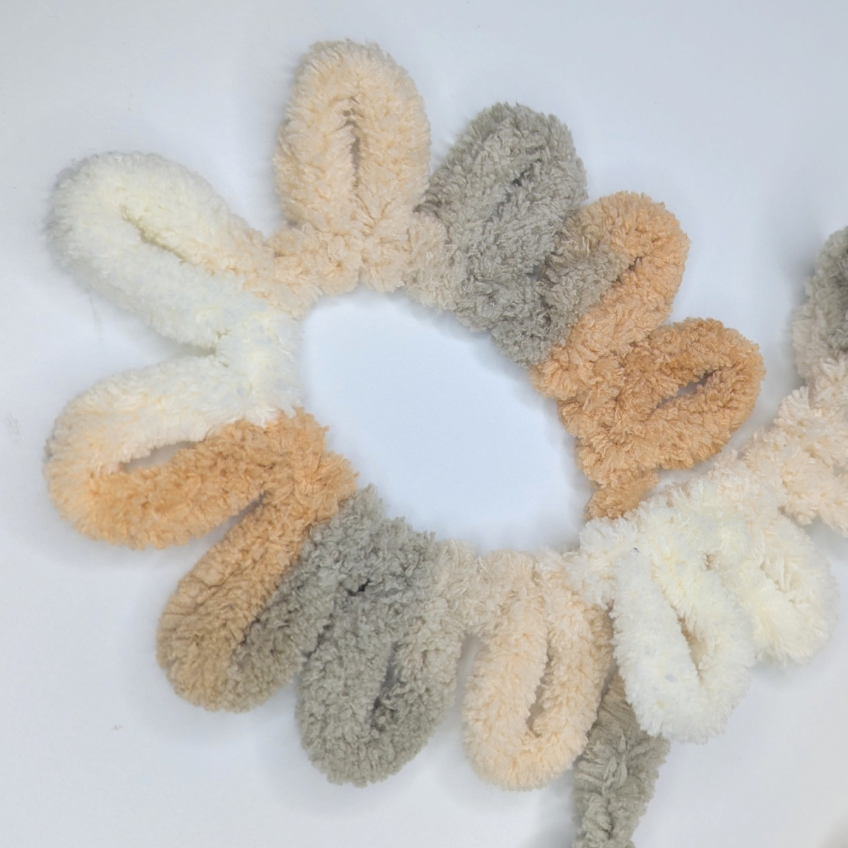 Maschenanschlag in Runde