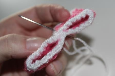 Blog-Inhaltsbild für 'Gratis Häkelanleitung Baby Stirnband mit Schleife'