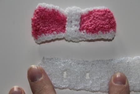 Blog-Inhaltsbild für 'Gratis Häkelanleitung Baby Stirnband mit Schleife'