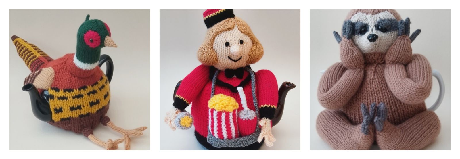 Three characterful knitted tea cosies displayed together: the Cinema Usherette with her torch and smart uniform, the proud pheasant with detailed plumage, and the laid‑back three‑toed sloth. Each cosy has a distinct personality and expressive features, photographed clearly to show the textures and colours of the knitting.