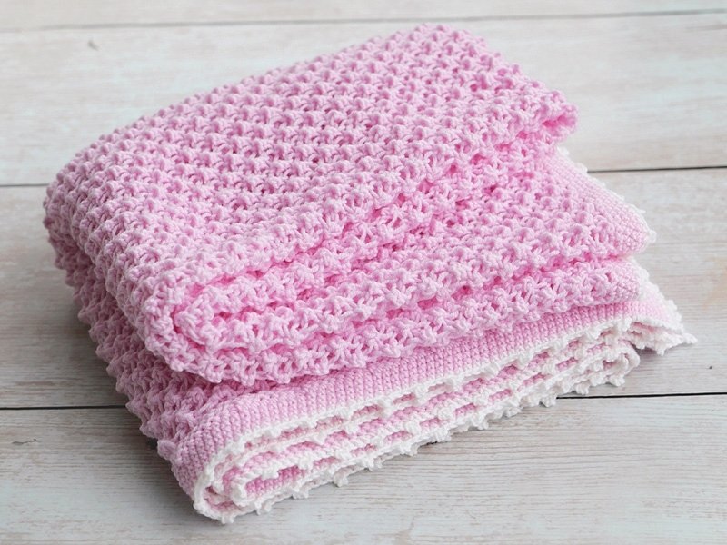 Blog-Inhaltsbild für 'Gratis Strickanleitung Decke im Röschenmuster'