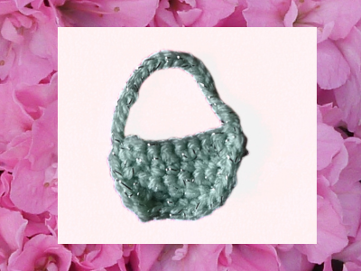 Blog-Inhaltsbild für 'Kostenlose Häkelanleitung für Osterhase und Körbchen aus Wollresten.'