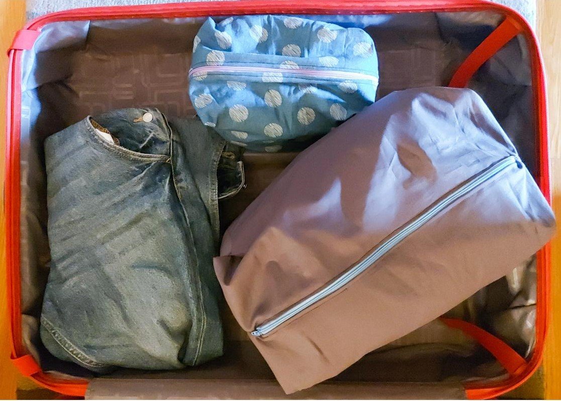 Blog-Inhaltsbild für 'Packwürfel nähen für mehr Ordnung auf Reisen'