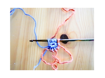 Blog-Inhaltsbild für 'Kostenlose Anleitung für tunesisch gehäkelten, runden Untersetzer'