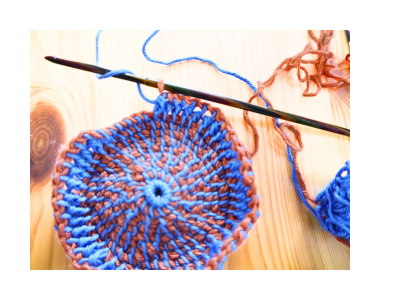 Blog-Inhaltsbild für 'Kostenlose Anleitung für tunesisch gehäkelten, runden Untersetzer'