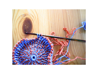 Blog-Inhaltsbild für 'Kostenlose Anleitung für tunesisch gehäkelten, runden Untersetzer'