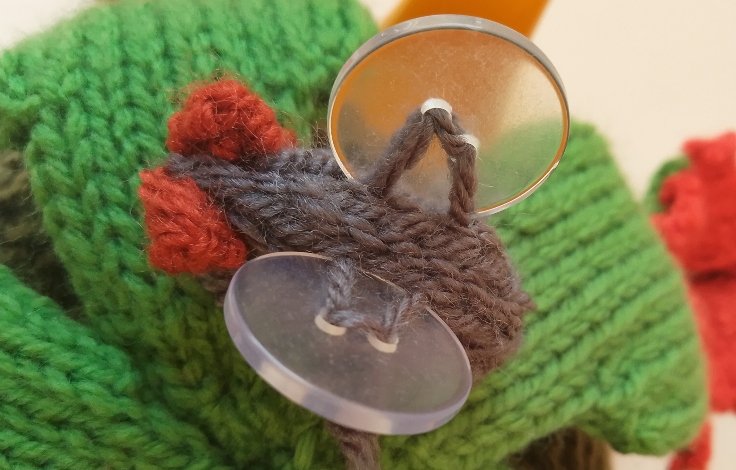 Knitted Fly with Button Wings from the Venus Flytrap Tea Cosy Design