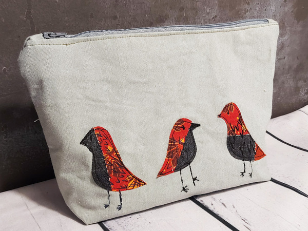 Applikation mit Vögeln aus kleinen Stoffresten nähen