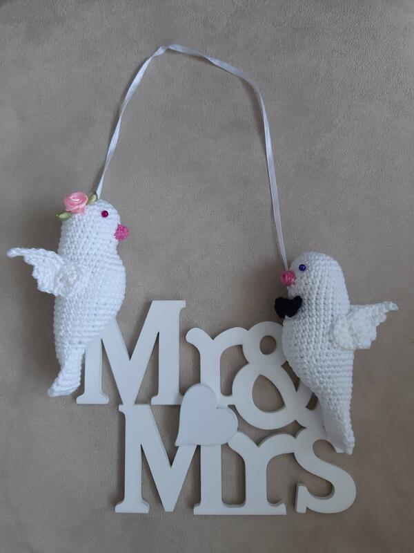 Wedding doves (bird), about 12 cm