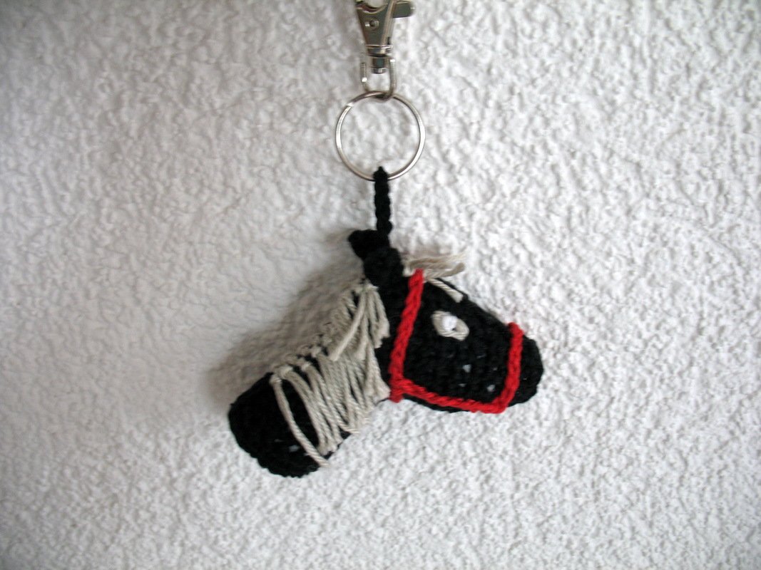 Schlüsselanhänger - Taschenbäumler - Pferdekopf Häkelanleitung