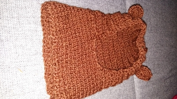 Wie ein Teddy sieht das Kind darin aus