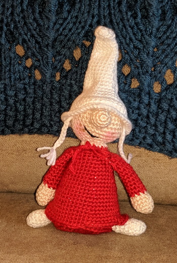 It's a bit hard to see but the nightgown and hat are in sparkly yarn.  She turned out very cute.