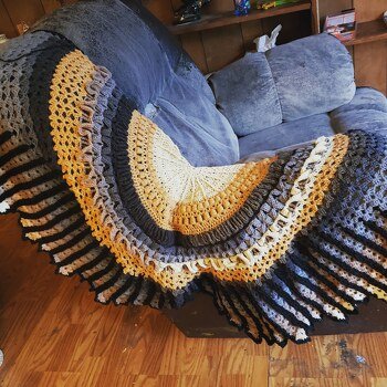 Wings of Love! Love, love, love this pattern. Used Mandala's Brownie and some black 3 weight, and it came out looking like hawk wings!