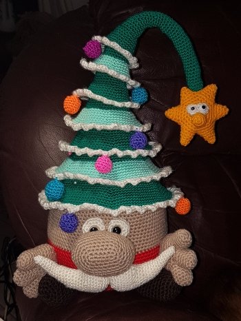 The grandkids loved it and even got a smile from my daughter. I was worried that I'd run out of the dark green so alternated with light green. Fun pattern to make.