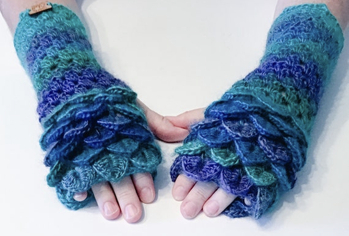 Dragonscale gloves! I love to make these when I get a chance. Especially with Red hearts unforgettable yarn