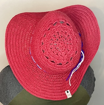 Red Sun hat made with all cotton yarn. Wire in the brim to help it pop out.