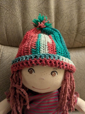 Die Mütze ist aus Schnupfis Mütze abgeleitet, nur entsprechend größer