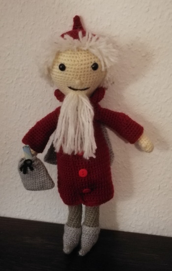 Weihnachtsgeschenk für den Jüngsten in unserem Clan - Moritz, 4 Monate :-)
Und im Säckchen kein Sand sondern Geld ;-)