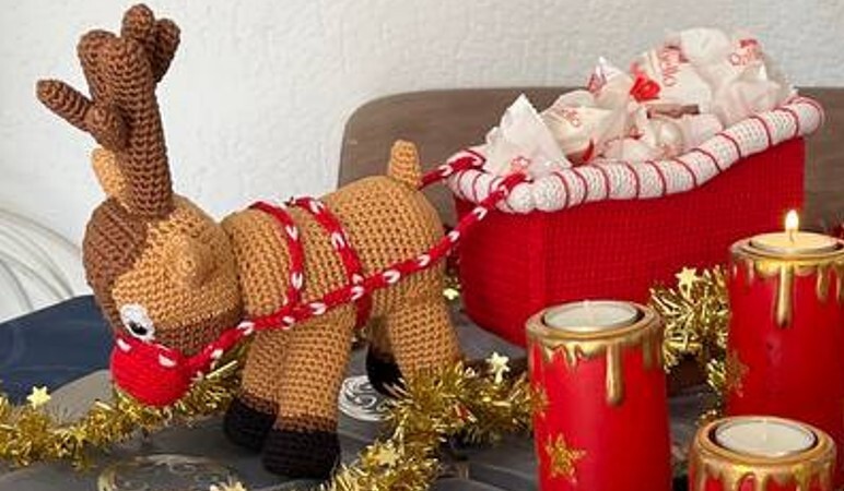 Rentinchen mit Schlitten