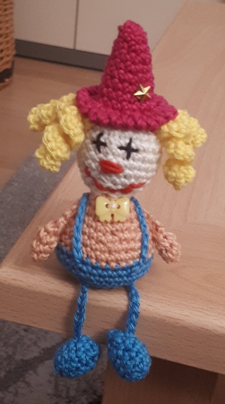 little sitting Clown several variants carneval funny present harlequin