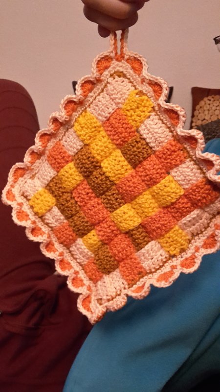 Topflappen im Webstil