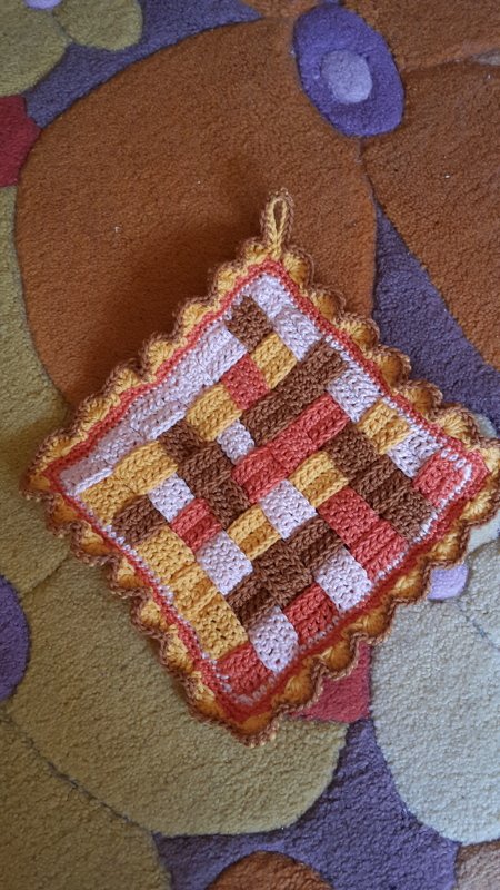 Topflappen im Webstil