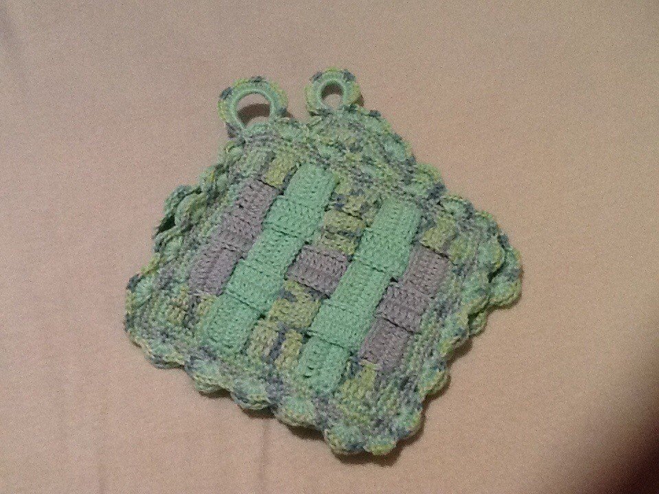 Topflappen im Webstil