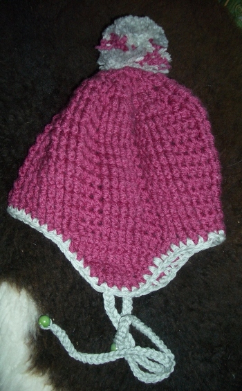 mit dem Bommel hatte ich einige Schwierigkeiten und auch das Bindeband hab ich verändert. Trotzdem eine wahre Pracht - oder?