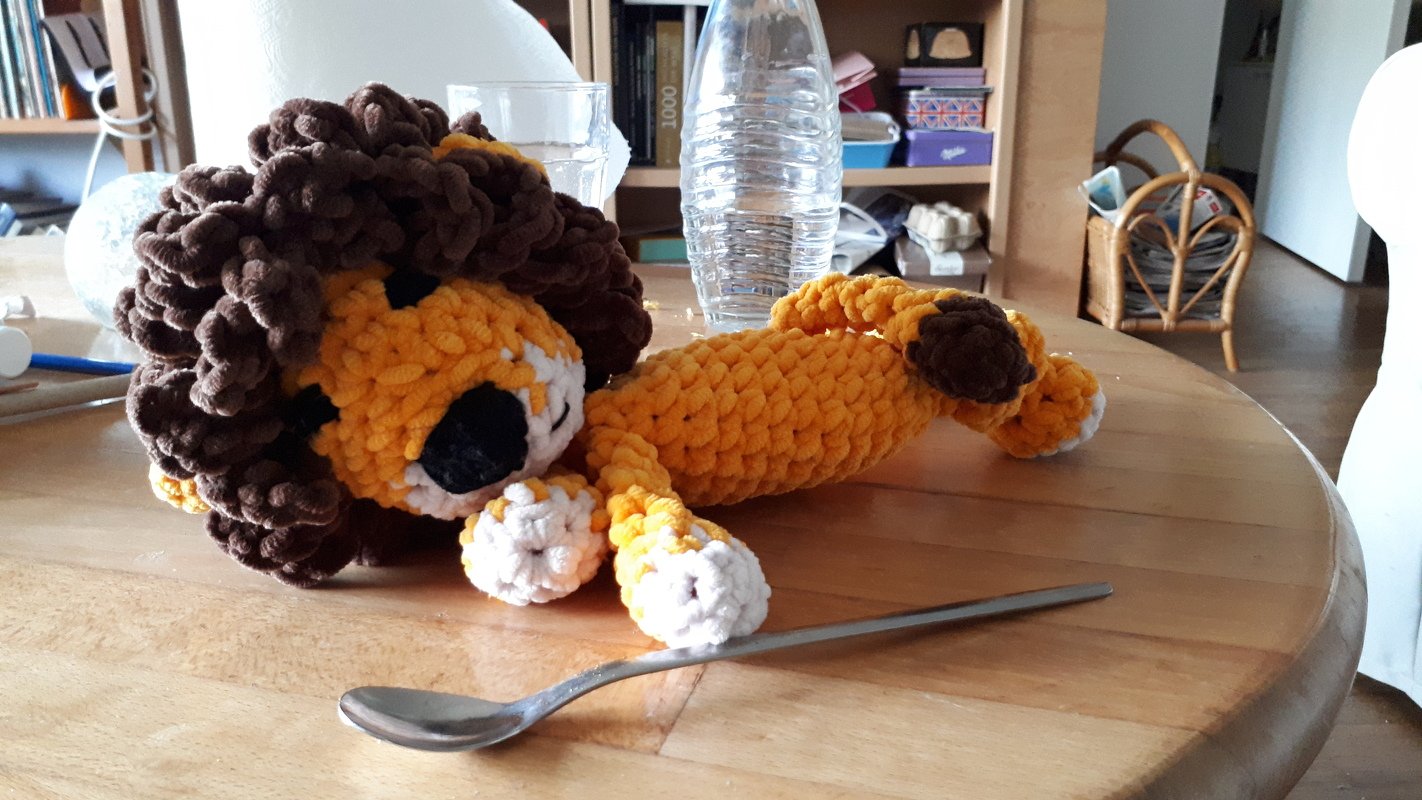 Lion crochet pattern. Lion snuggler. Lion lovey with knotted legs
