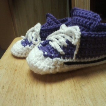 I couldn't follow the pattern for the sole, so I used another pattern.  I also had to double the purple to keep the shoe from pulling inward from the sole.  I am going to try them again in a different color.