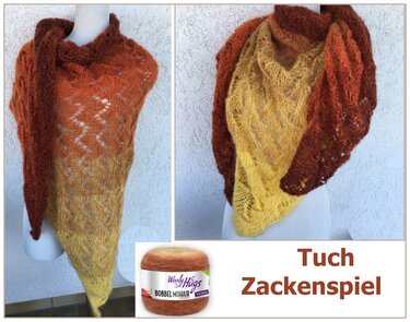 Gestricktes Dreieckstuch „Zackenspiel“ mit Farbverlauf Braun‑Orange zu Gelb und Zacken‑Lochmuster, auf einer Schaufensterpuppe drapiert